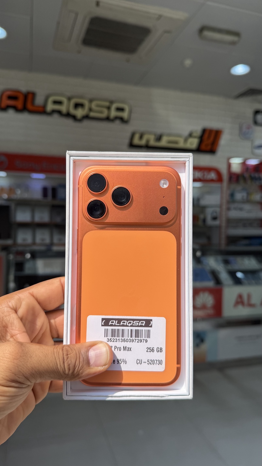 Orange iPhone 17 Pro Max at Al Aqsa Phone Service Center