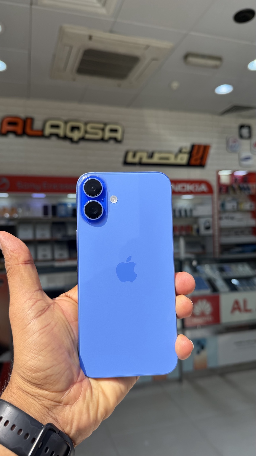 Blue iPhone at the shop